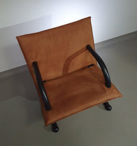 2 post-modern T-line armchairs