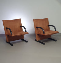 2 post-modern T-line armchairs