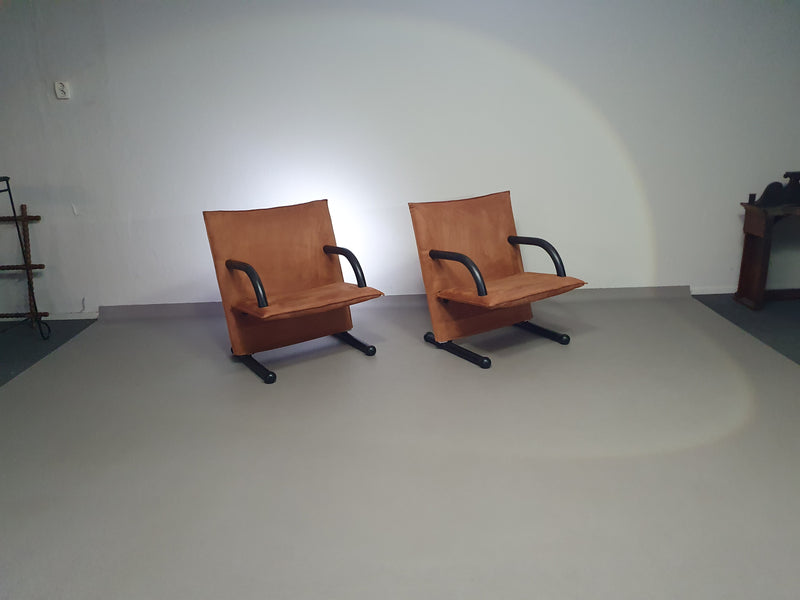 2 post-modern T-line armchairs