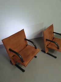2 post-modern T-line armchairs