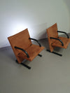 2 post-modern T-line armchairs
