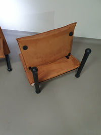 2 post-modern T-line armchairs