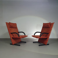 2 post modern t-line armchairs