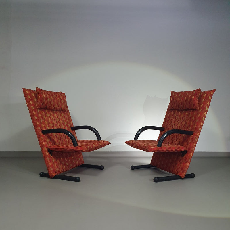 2 post modern t-line armchairs