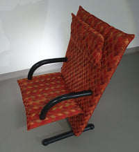 2 post modern t-line armchairs