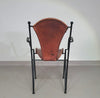 24 chairs in leather and solid wrought iron