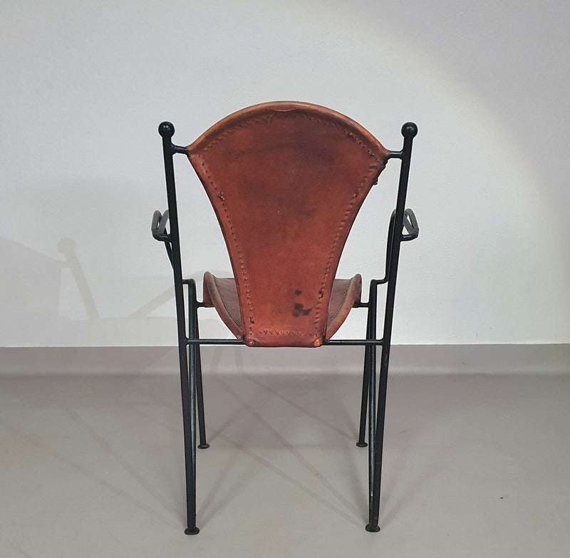 24 chairs in leather and solid wrought iron
