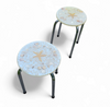 Stools with a decorative top made with sand , seashells, and a starfish embedded in a clear acrylic / 1970s