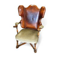 Rare leather and oak wing chair designed by Theo Ruth for Artifort / f 297 from 1949