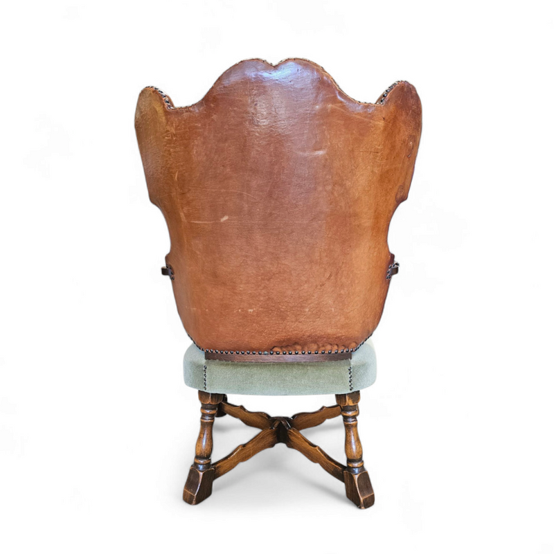 Rare leather and oak wing chair designed by Theo Ruth for Artifort / f 297 from 1949
