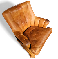 Sheep Leather club chair 1970s with magazine holder