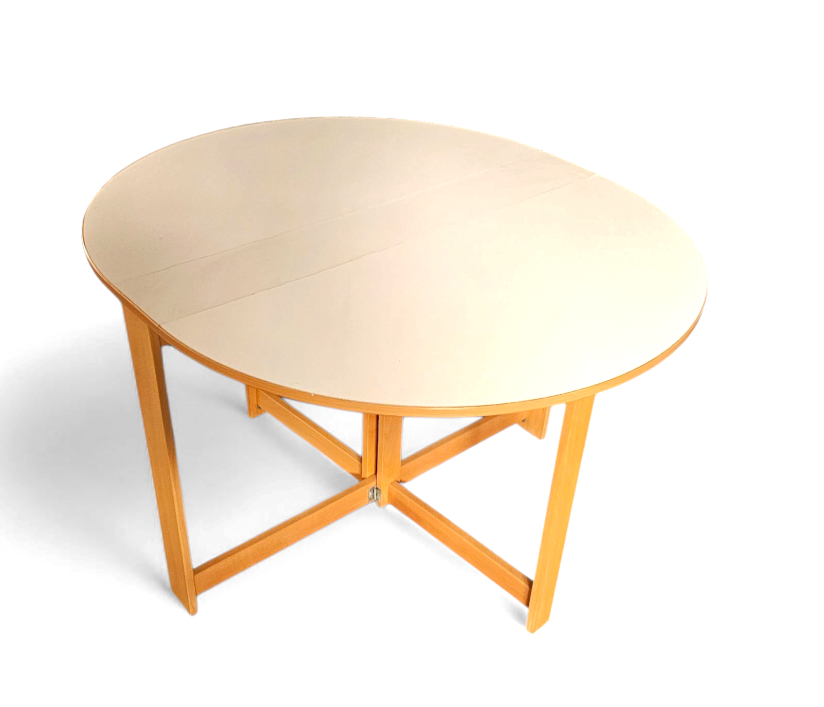 Vintage scandinavian folding dining table with side leaves. The oval top is made of white formica