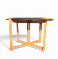 Vintage scandinavian folding dining table with side leaves. The oval top is made of white formica