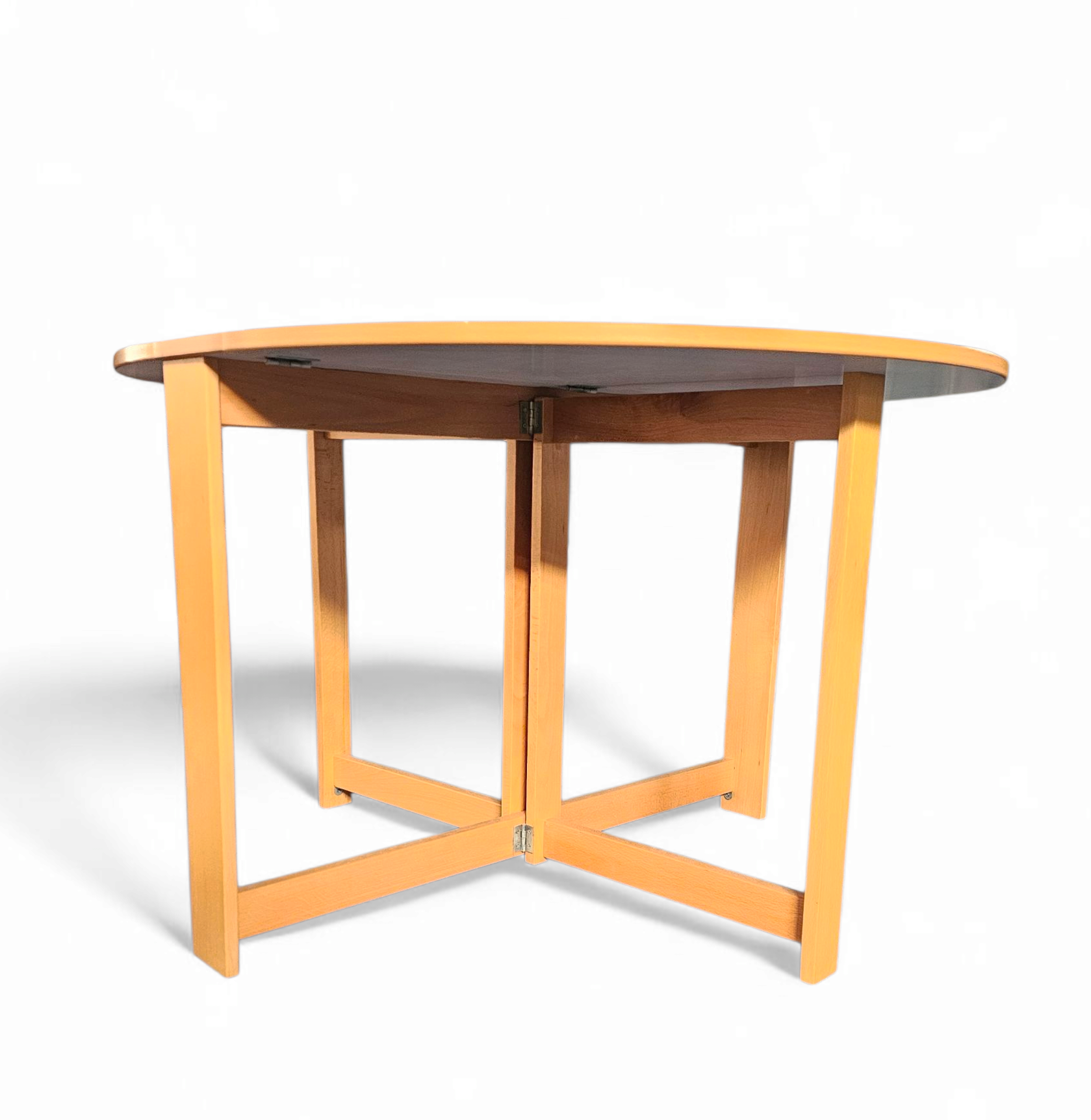 Vintage scandinavian folding dining table with side leaves. The oval top is made of white formica