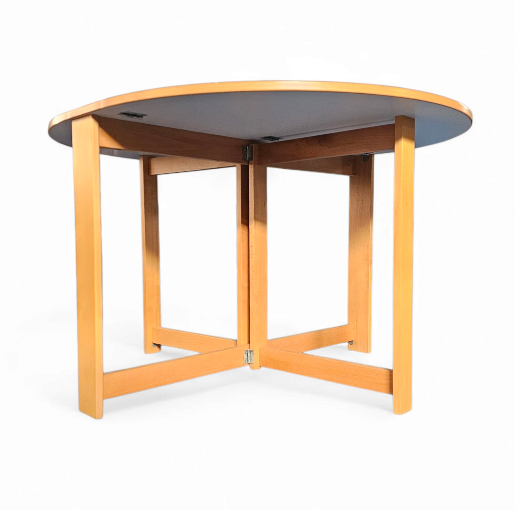 Vintage scandinavian folding dining table with side leaves. The oval top is made of white formica