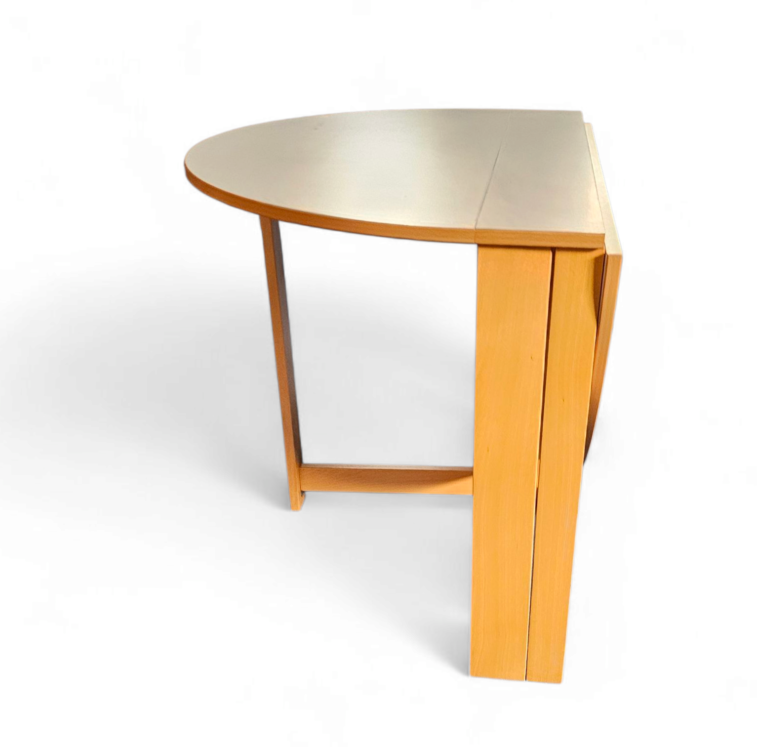 Vintage scandinavian folding dining table with side leaves. The oval top is made of white formica