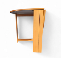 Vintage scandinavian folding dining table with side leaves. The oval top is made of white formica