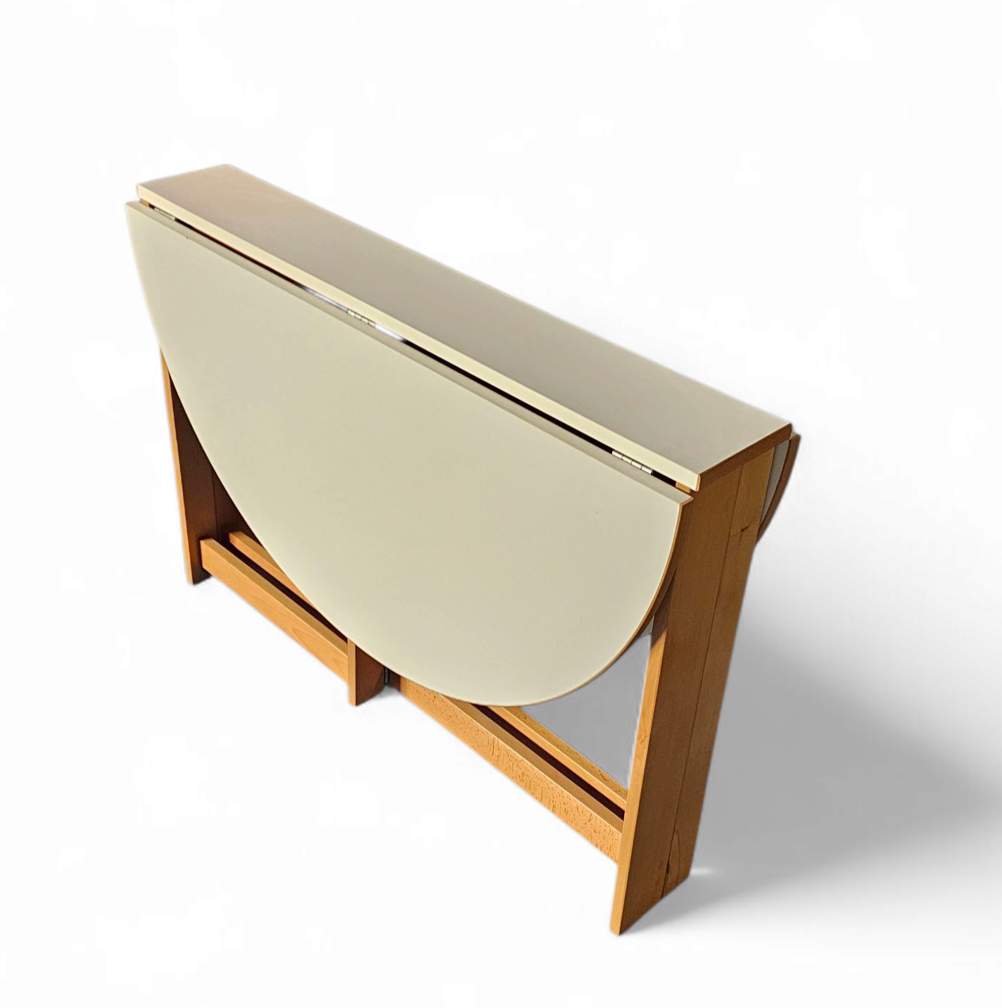 Vintage scandinavian folding dining table with side leaves. The oval top is made of white formica