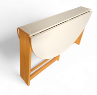 Vintage scandinavian folding dining table with side leaves. The oval top is made of white formica