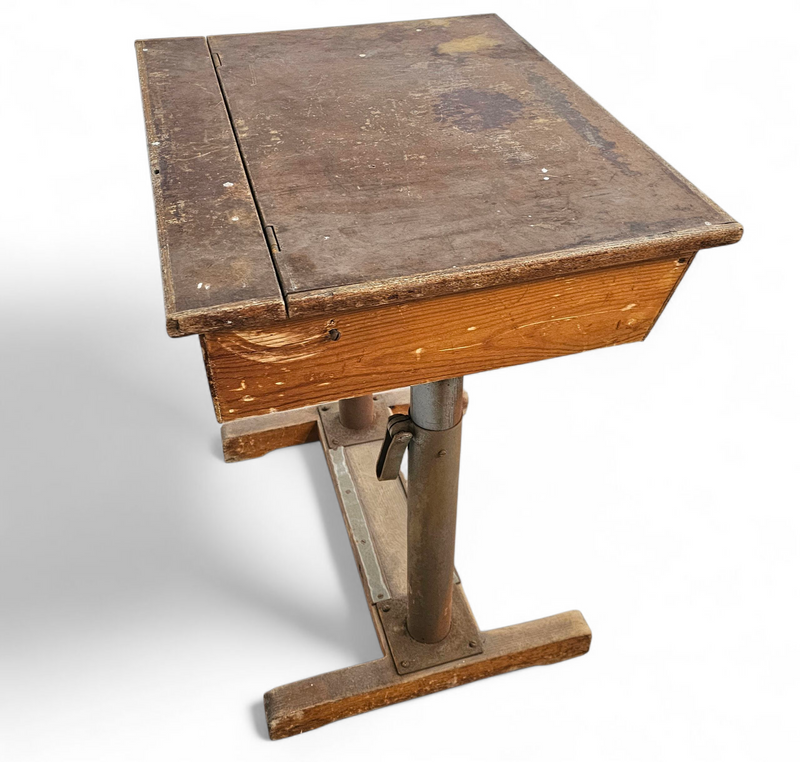 Matching school chair and table / both adjustable by
Grythyttan / first half of the 20th century