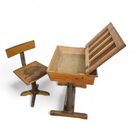 Matching school chair and table / both adjustable by
Grythyttan / first half of the 20th century