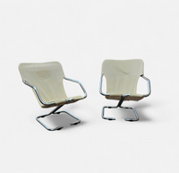 2 x Tubular chrome cantilever chair with a cream canvas sling