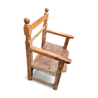 Old Spanish pine wood arm chair