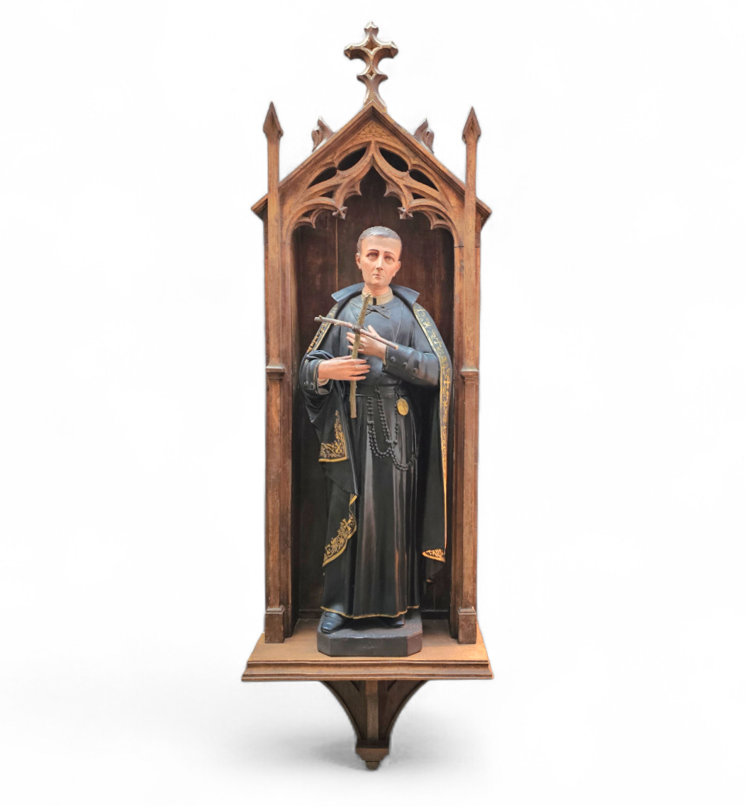 Statue of a religious figure / Patron Saint Gerard Majella / placed in a Gothic niche / labeled /