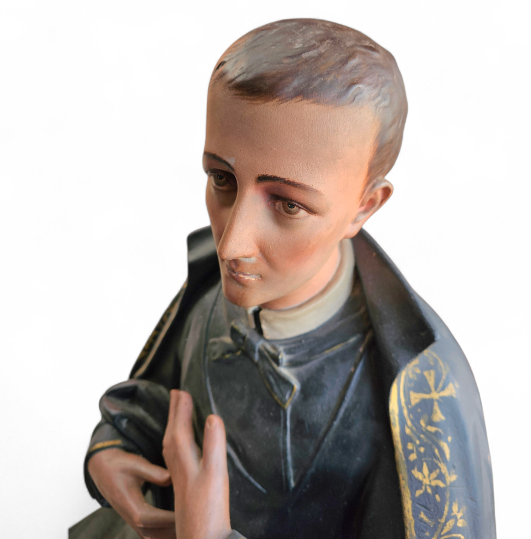 Statue of a religious figure / Patron Saint Gerard Majella / placed in a Gothic niche / labeled /
