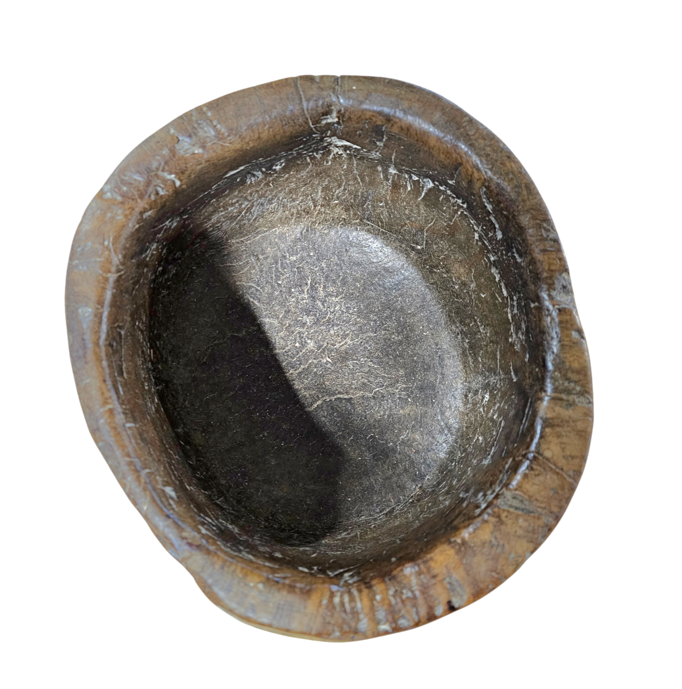 A substantial hand-hewn wooden bowl carved from a single burl section