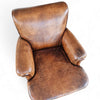 Beautiful and stately old English sheep leather club chair with armrests
