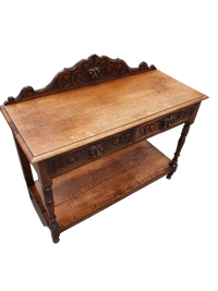 Victorian Gothic Oak side table, decorative carved round 1920. Green Mask decoration