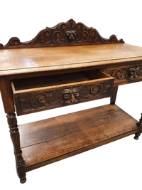 Victorian Gothic Oak side table, decorative carved round 1920. Green Mask decoration