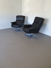 2 calf black leather lounge chairs