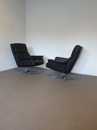 2 calf black leather lounge chairs