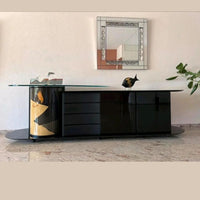 Unique dressoir by Carlo Malnati, produced around the 1980’s. The art work is made out of inlaid wood, using different colored pieces to create the design. 260 x 77 x 70 deep