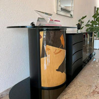 Unique dressoir by Carlo Malnati, produced around the 1980’s. The art work is made out of inlaid wood, using different colored pieces to create the design. 260 x 77 x 70 deep
